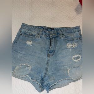 Blue ripped jean shorts
